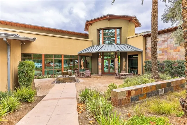 a view of residential houses with outdoor space