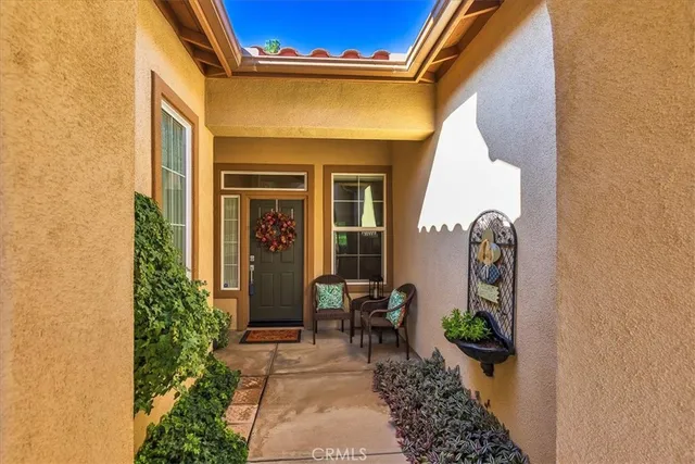 a view of a livingroom with a fireplace and workspace