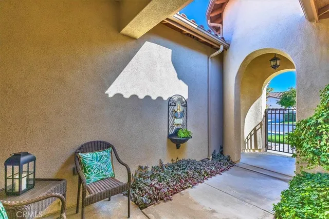 a view of a livingroom with furniture and entryway