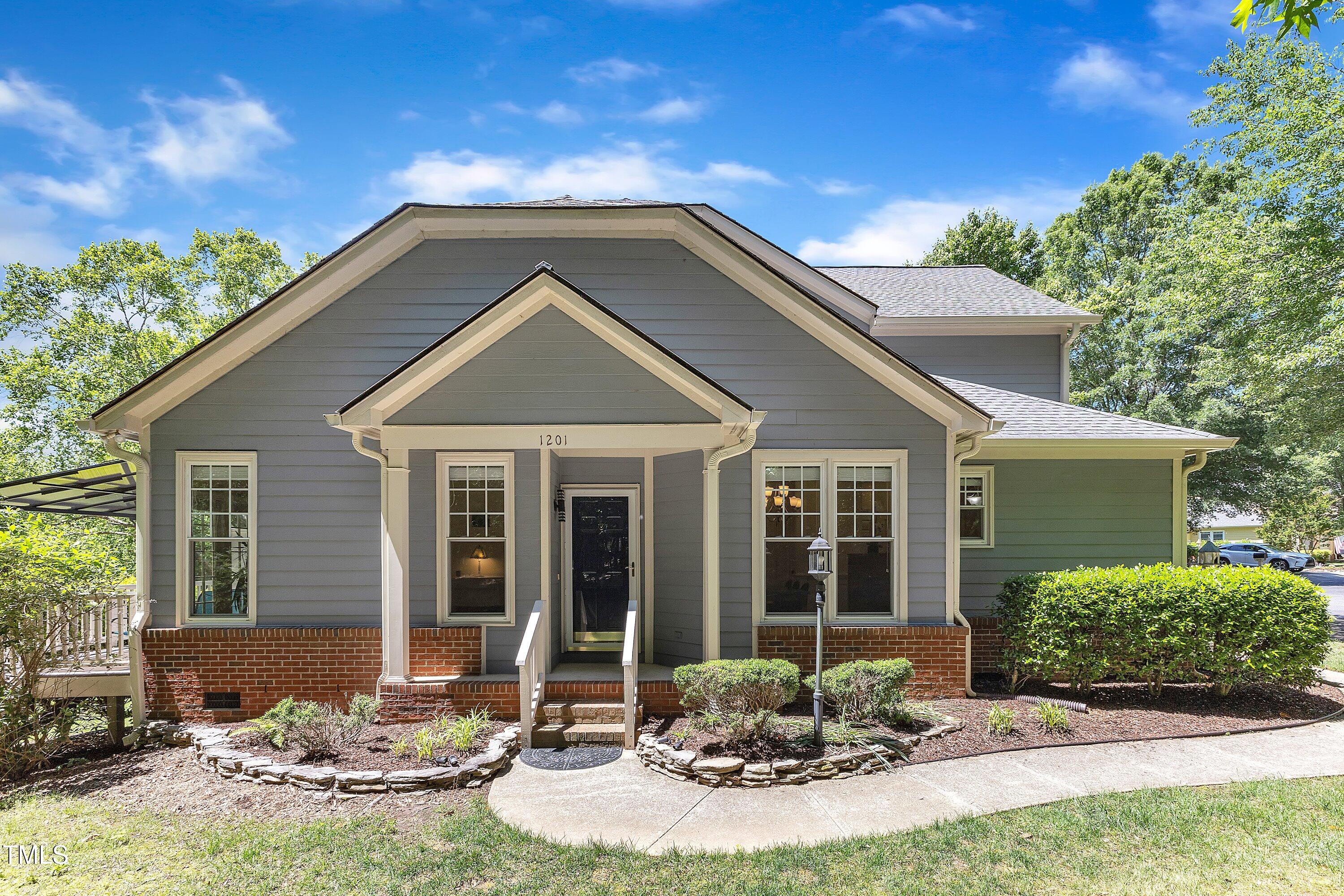 1201 Red Beech Court Raleigh, NC 27614 - Photo 1 of 41 Front door, situated on the side of the home, come around to the left of the building once you park