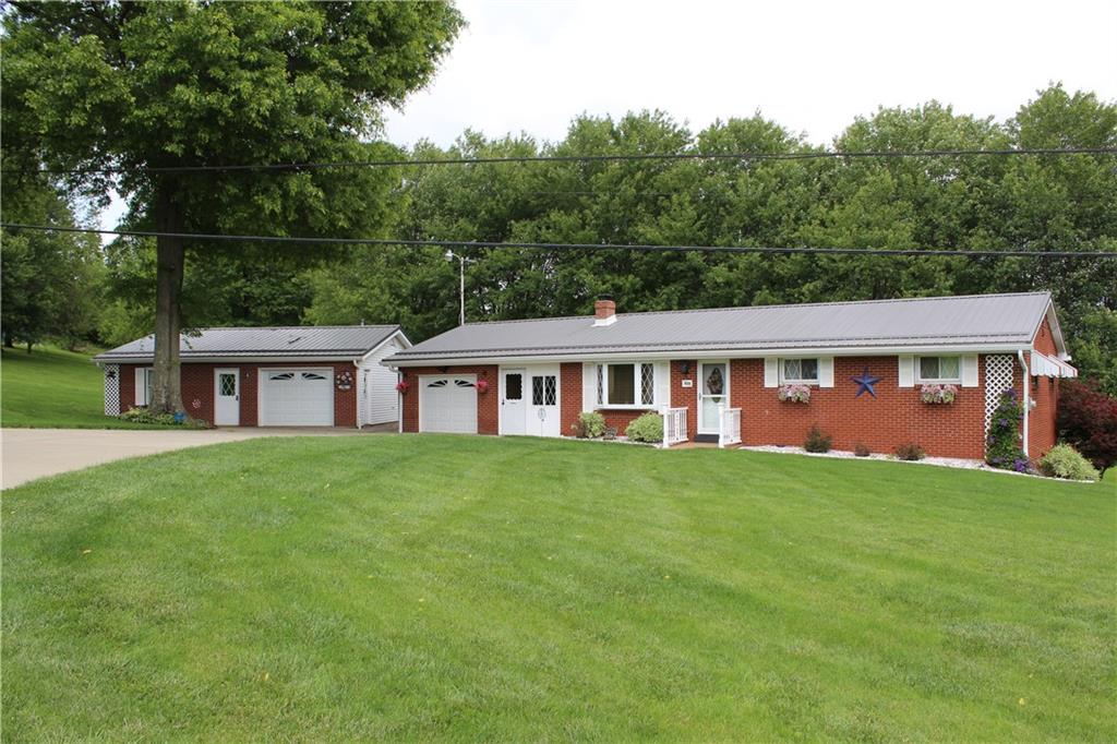 928 Old Ridge Road Avella, PA 15312 - Photo 1 of 49 a view of a house with a yard