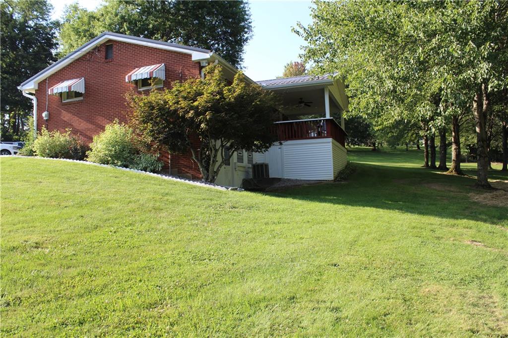 928 Old Ridge Road Avella, PA 15312 - Photo 16 of 49 a house view with a outdoor space