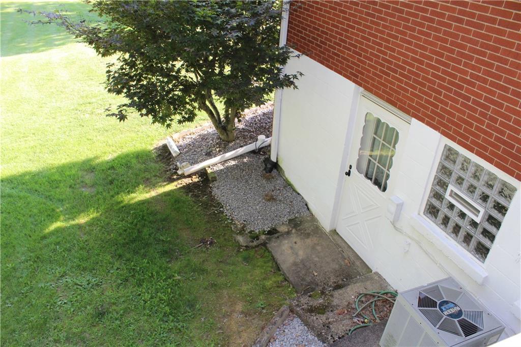 928 Old Ridge Road Avella, PA 15312 - Photo 18 of 49 a backyard of a house with lots of green space