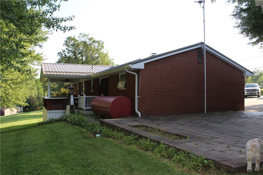 928 Old Ridge Road Avella, PA 15312 - Photo 20 of 49 a view of a house with a backyard