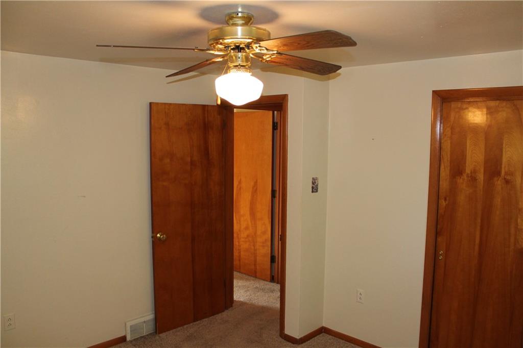 928 Old Ridge Road Avella, PA 15312 - Photo 25 of 49 a view of a chandelier fan and closet