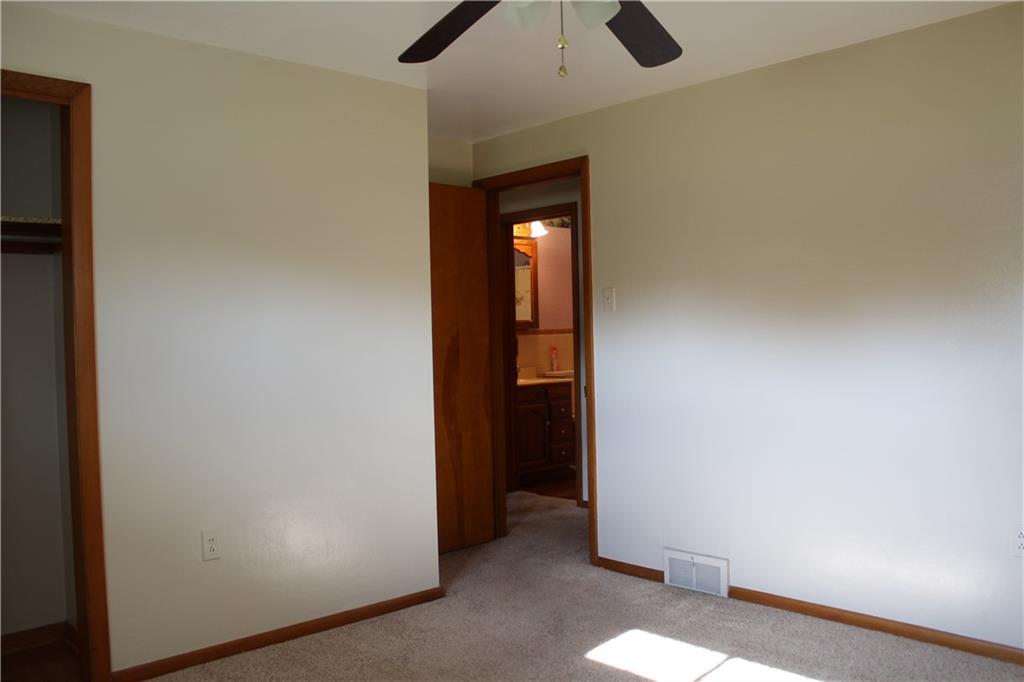 928 Old Ridge Road Avella, PA 15312 - Photo 27 of 49 a view of an empty room with wooden floor