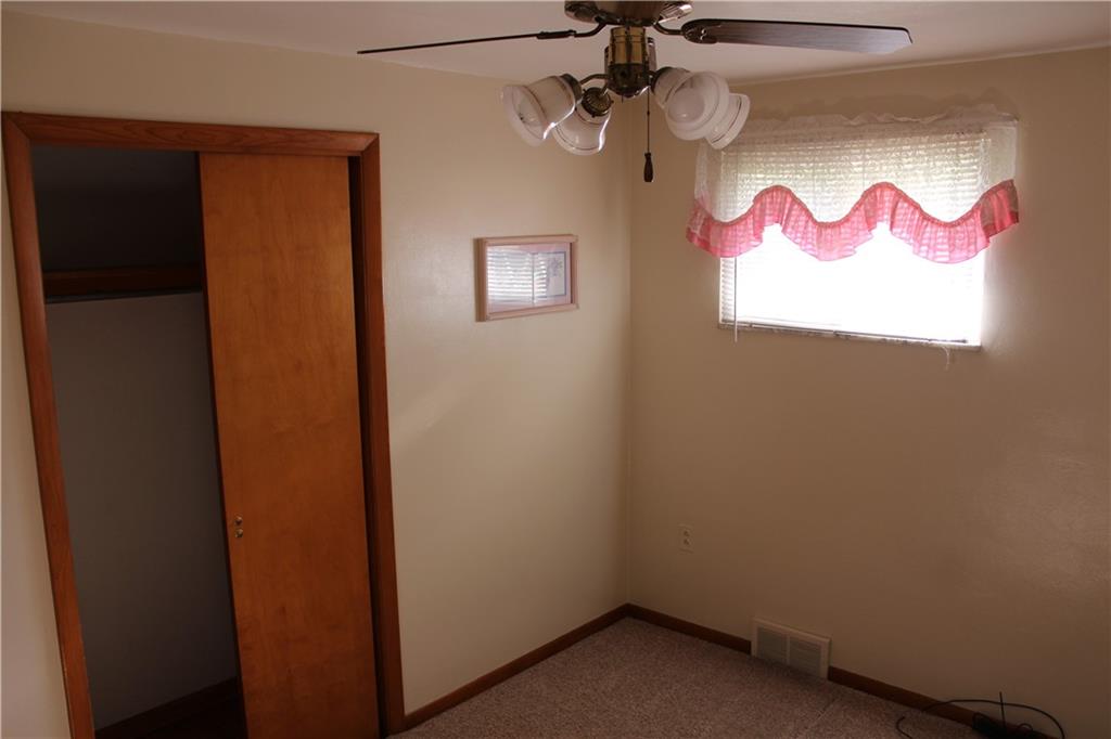 928 Old Ridge Road Avella, PA 15312 - Photo 31 of 49 an empty room with a window and a potted plant