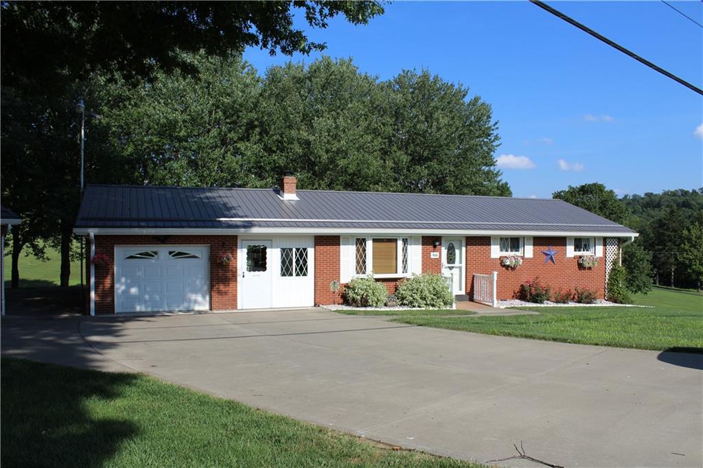 928 Old Ridge Road Avella, PA 15312 - Photo 47 of 49 front view of a house with a yard