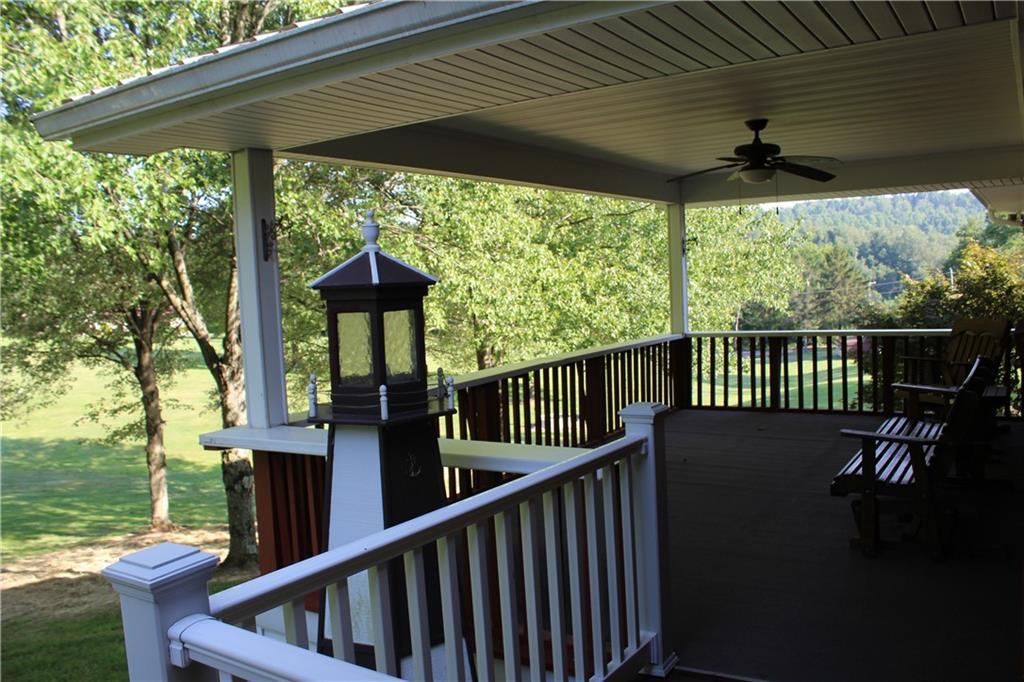 928 Old Ridge Road Avella, PA 15312 - Photo 9 of 49 a view of a porch with furniture and backyard