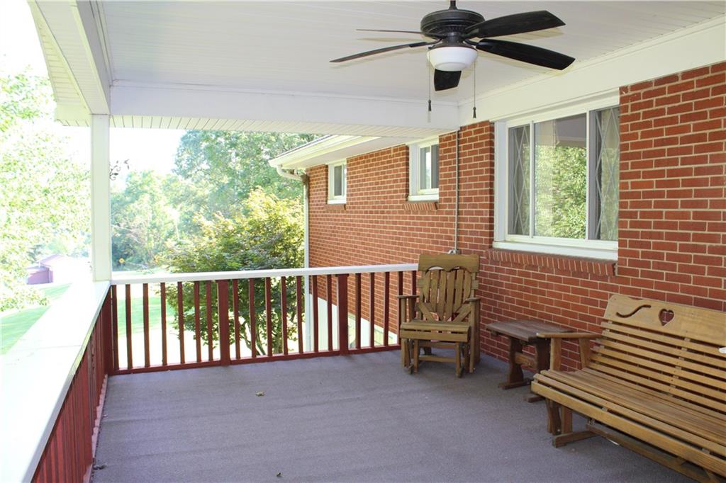 928 Old Ridge Road Avella, PA 15312 - Photo 10 of 49 a view of a balcony with a ceiling fan