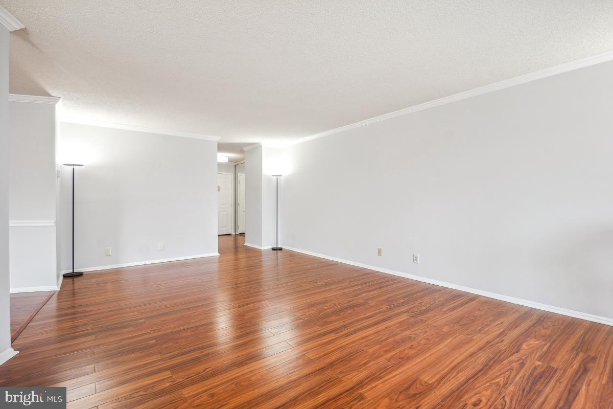 5903 Mt Eagle Drive, Unit 314 Alexandria, VA 22303 - Photo 11 of 44 a view of empty room with wooden floor