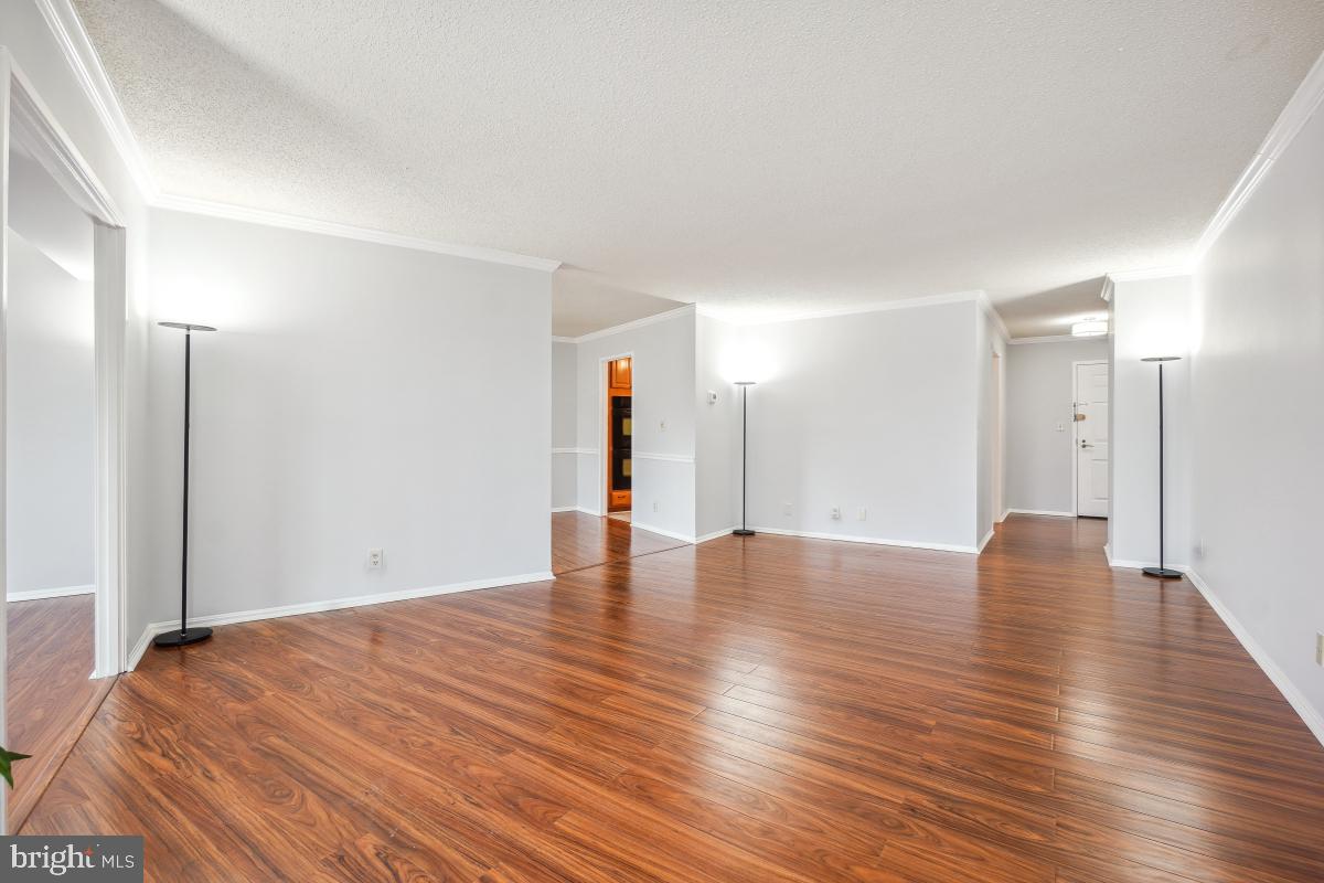 5903 Mt Eagle Drive, Unit 314 Alexandria, VA 22303 - Photo 12 of 44 a view of empty room with wooden floor