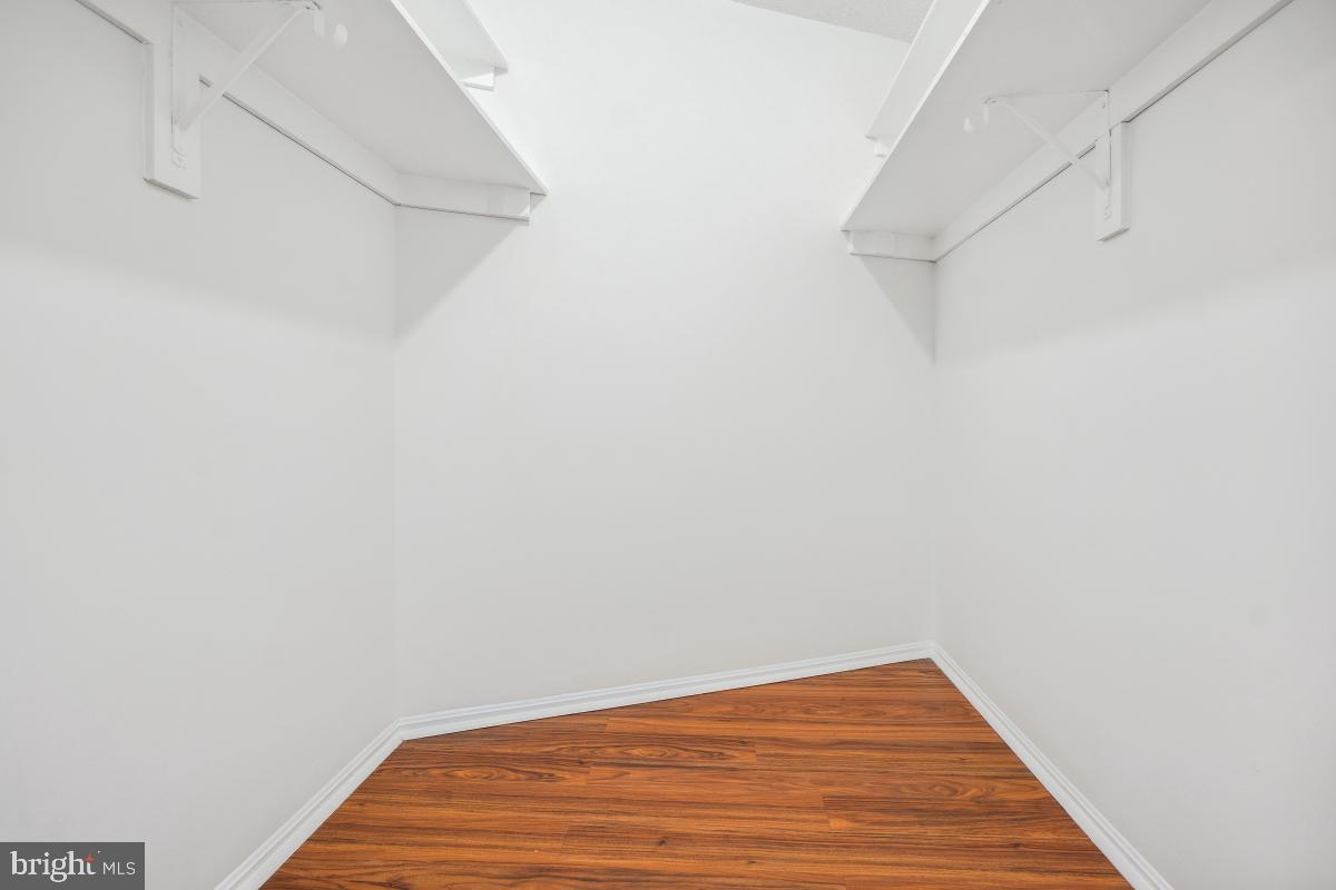 5903 Mt Eagle Drive, Unit 314 Alexandria, VA 22303 - Photo 31 of 44 a view of a small space with racks on the wall