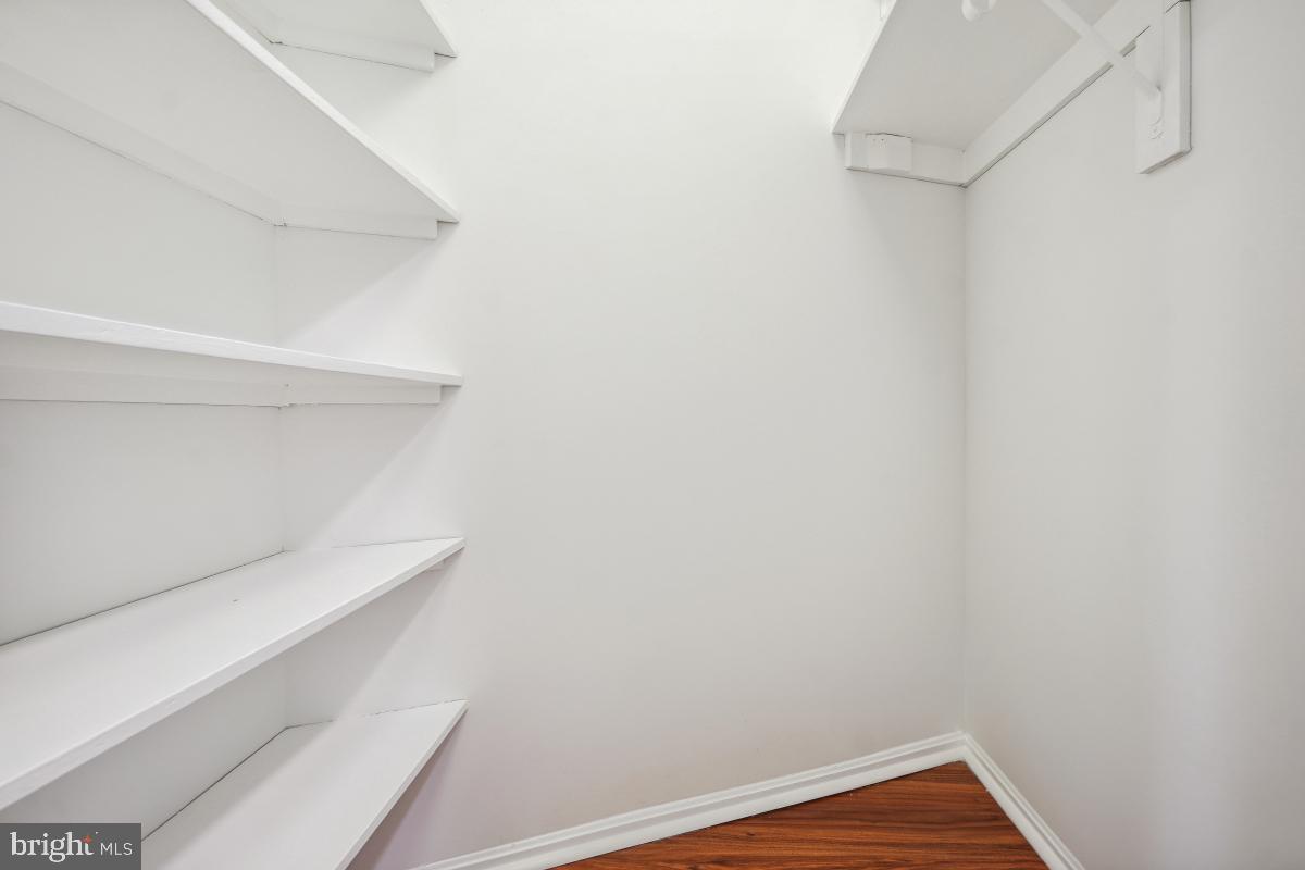 5903 Mt Eagle Drive, Unit 314 Alexandria, VA 22303 - Photo 32 of 44 a view of small space with racks on the wall