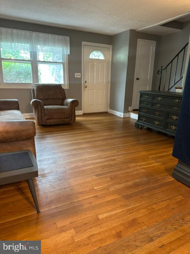 1619 Inverness Avenue Baltimore, MD 21230 - Photo 6 of 30 a view of a livingroom with furniture staircase and windows