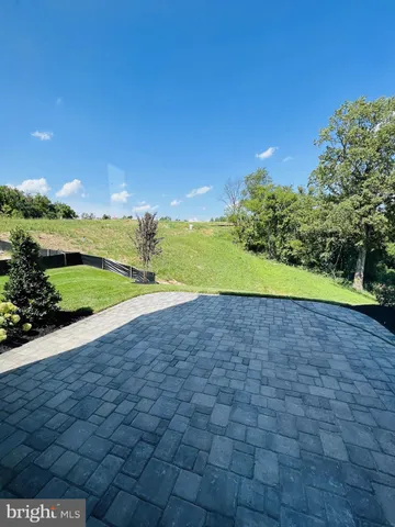 a view of a yard with an trees