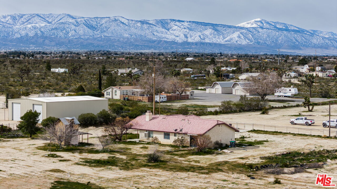 13377 Paramount Road Phelan, CA 92371 - Photo 2 of 28 a view of a house with outdoor space