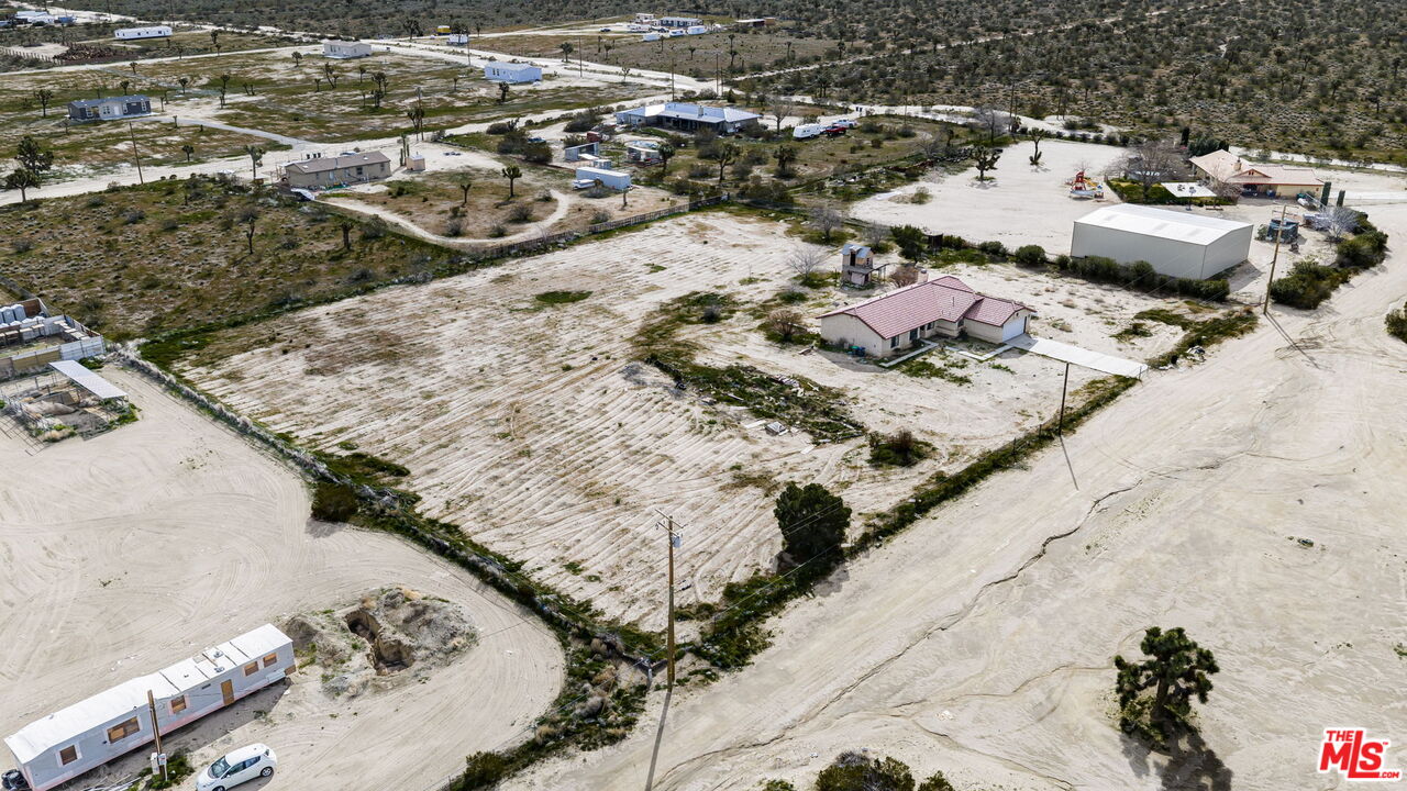 13377 Paramount Road Phelan, CA 92371 - Photo 23 of 28 a view of a terrace with wooden floor