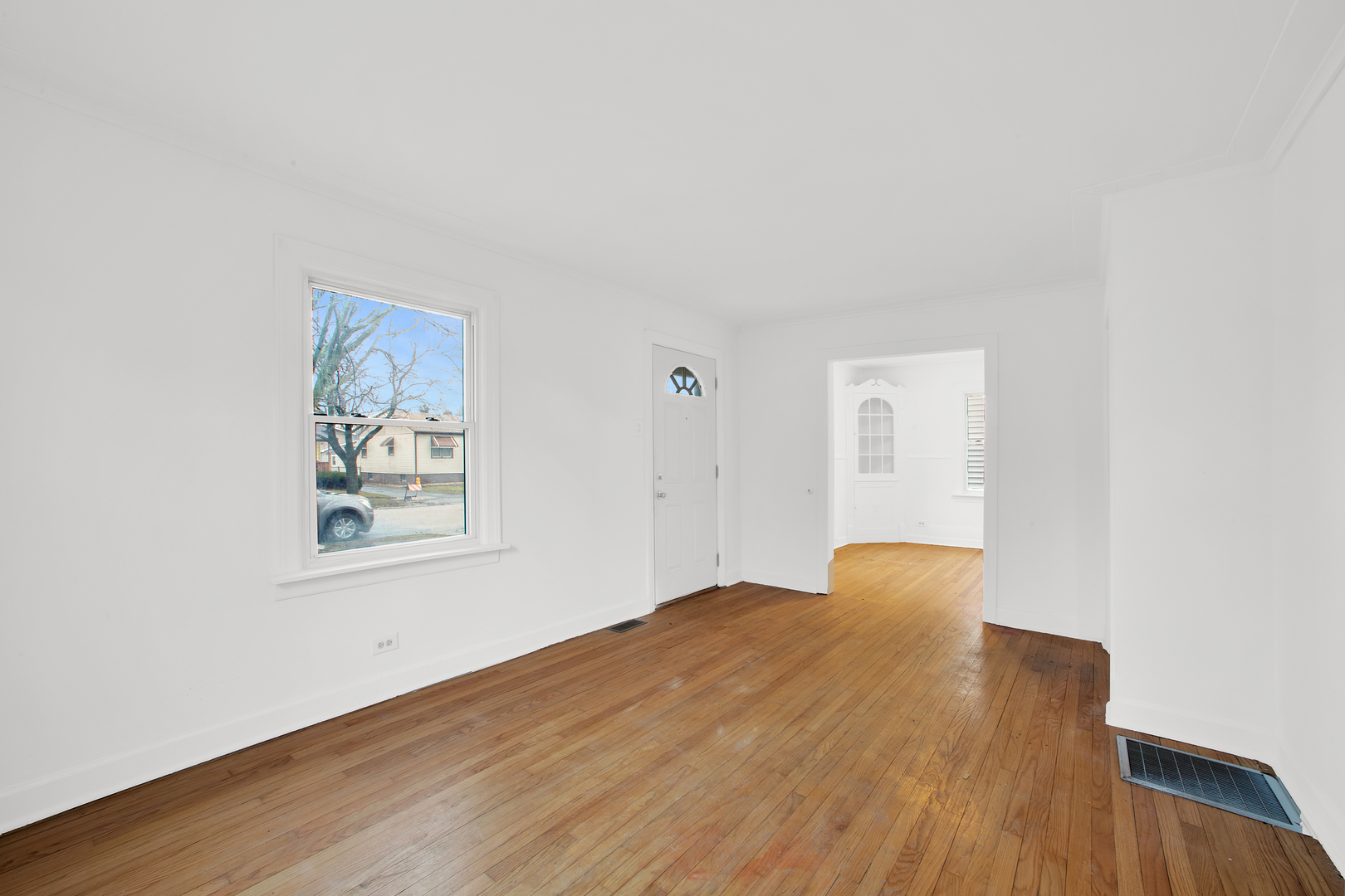 15014 Ridgeway Avenue Midlothian, IL 60445 - Photo 11 of 18 a view of empty room with wooden floor