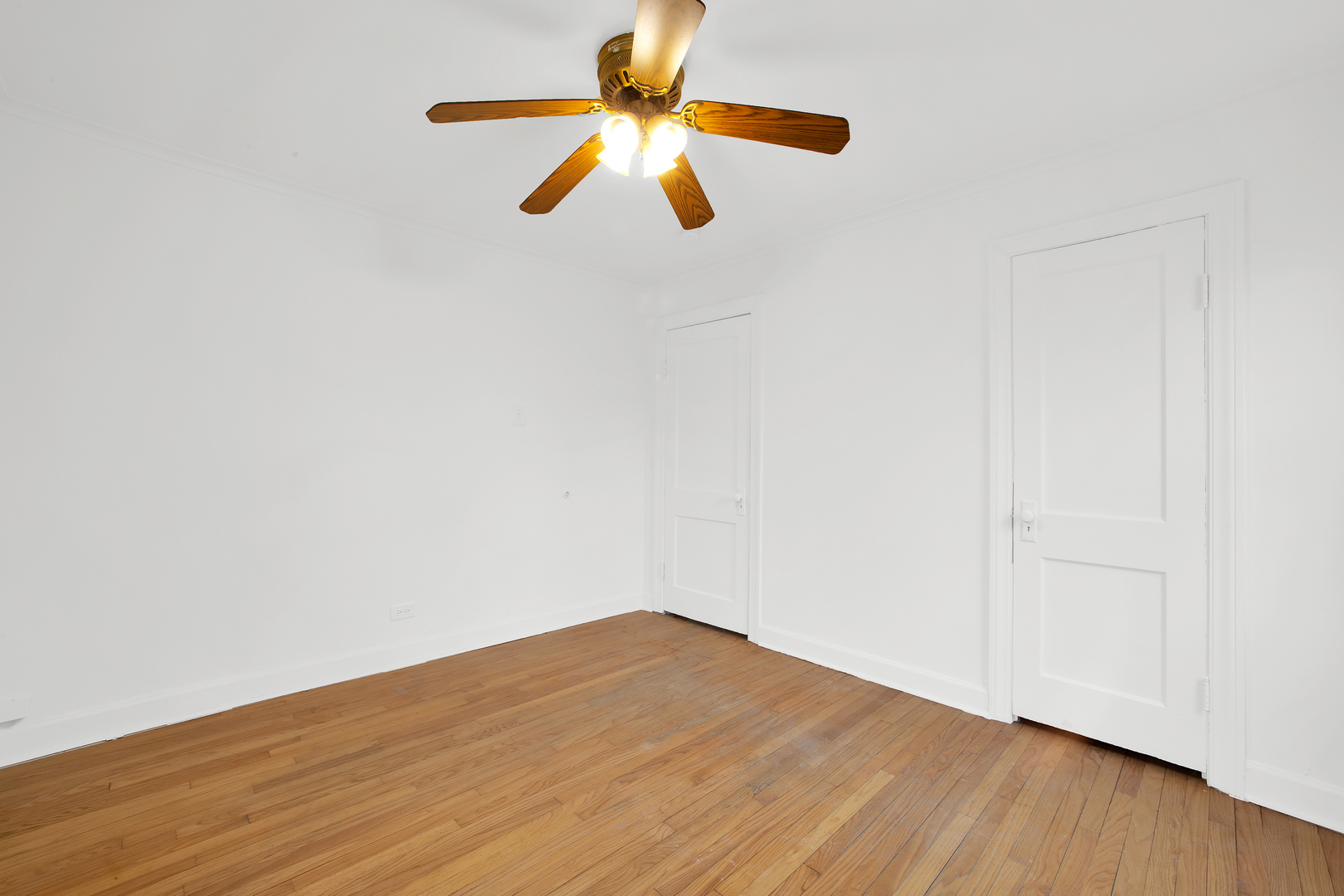 15014 Ridgeway Avenue Midlothian, IL 60445 - Photo 3 of 18 a view of empty room with wooden floor