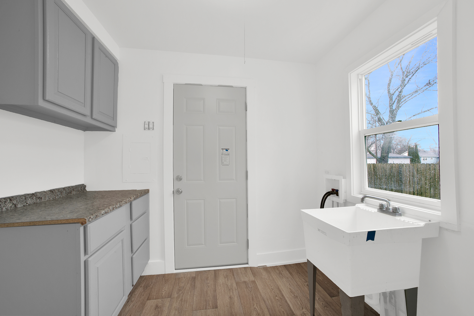 15014 Ridgeway Avenue Midlothian, IL 60445 - Photo 7 of 18 a view of a bathroom with a sink and mirror