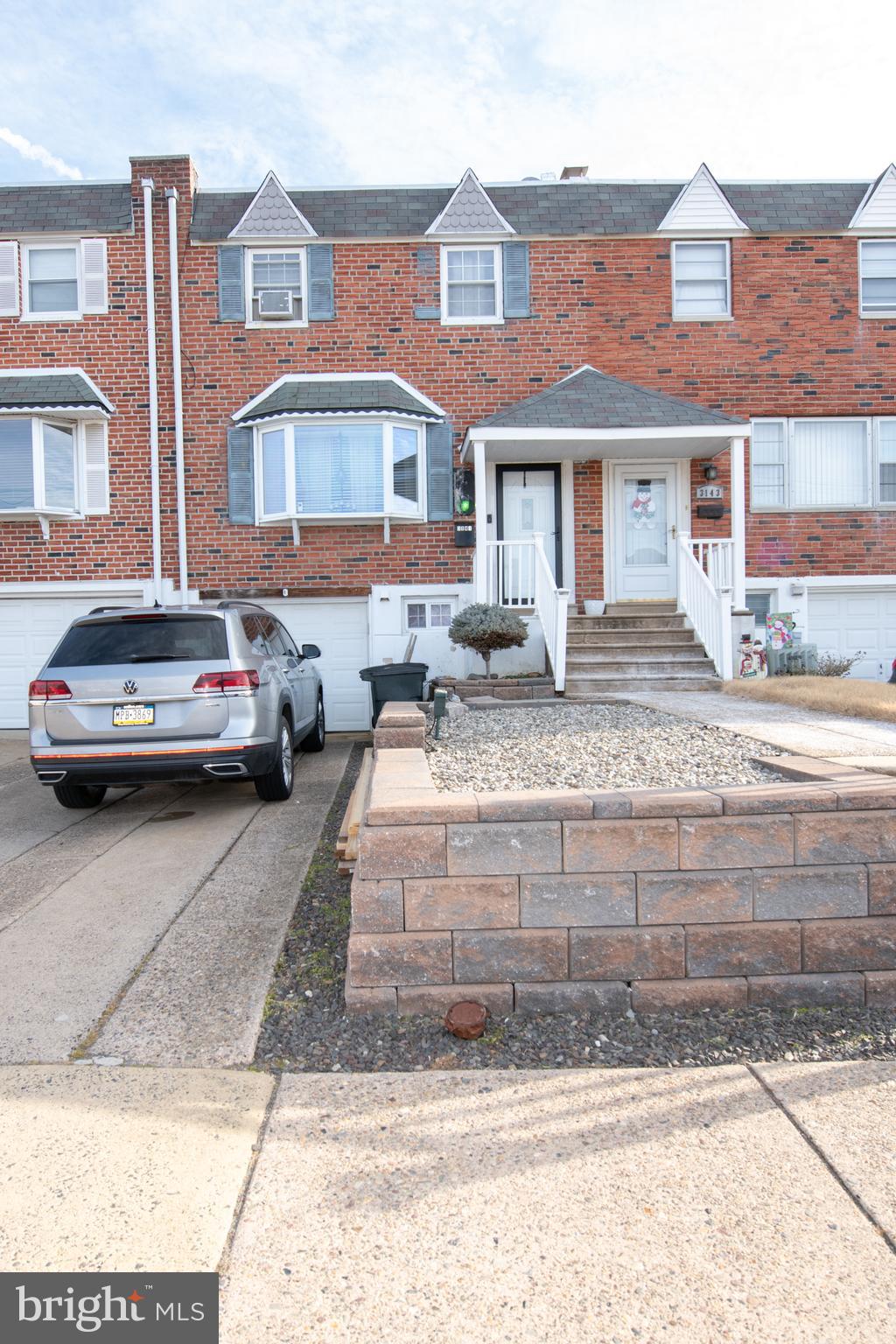 3141 Belgreen Road Philadelphia, PA 19154 - Photo 2 of 51 a front view of a house with cars parked