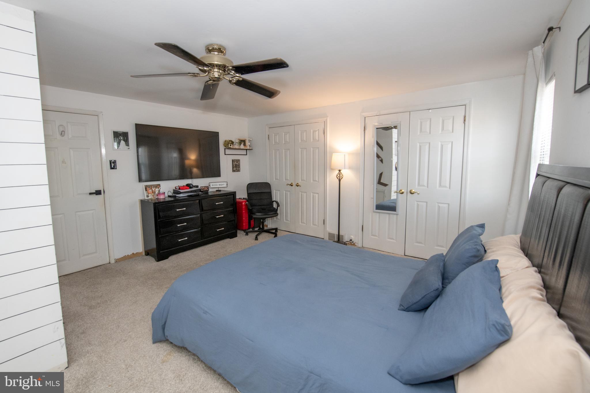 3141 Belgreen Road Philadelphia, PA 19154 - Photo 22 of 51 a living room with furniture and a flat screen tv