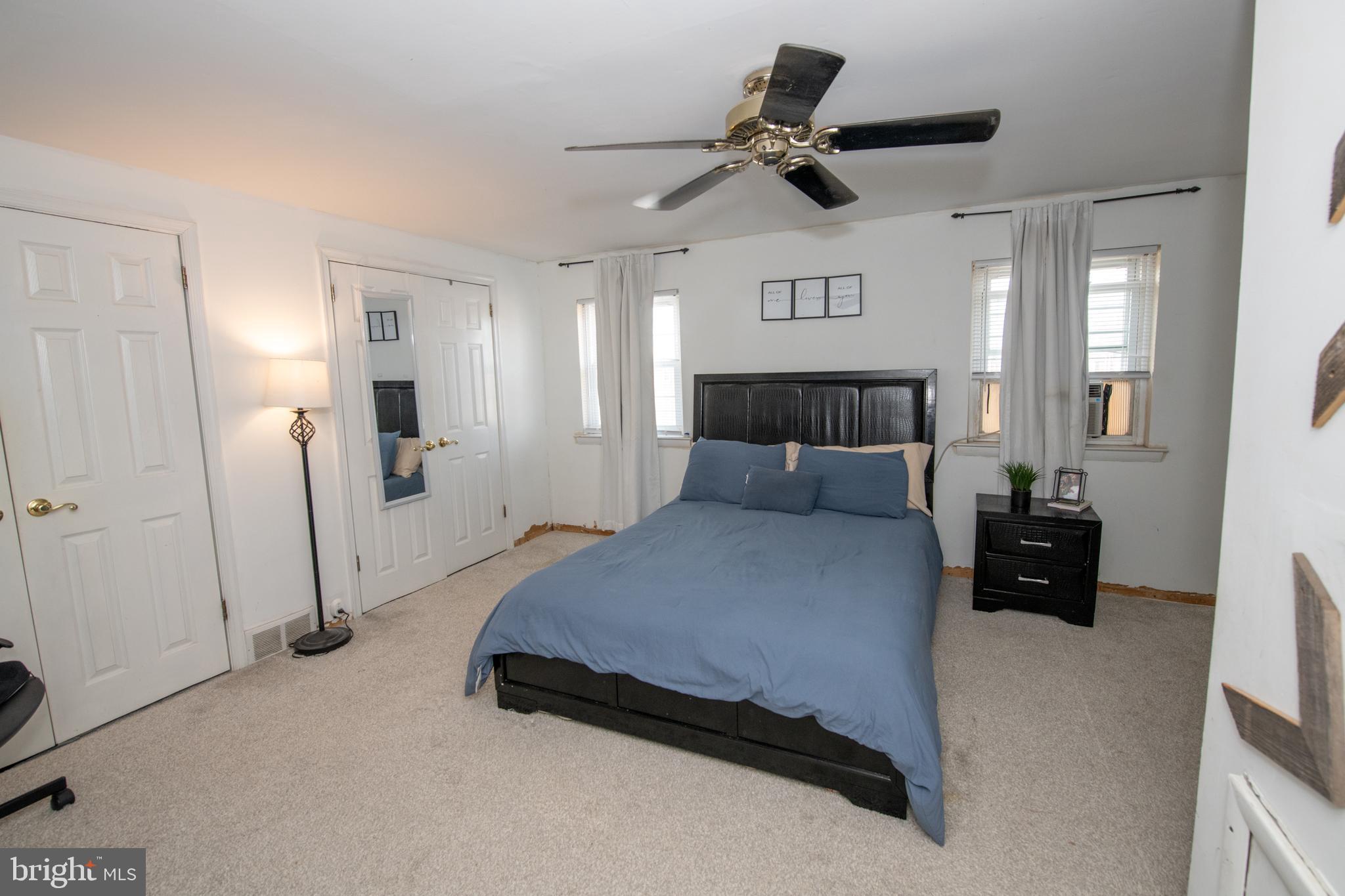 3141 Belgreen Road Philadelphia, PA 19154 - Photo 26 of 51 a bed room with a bed and a ceiling fan