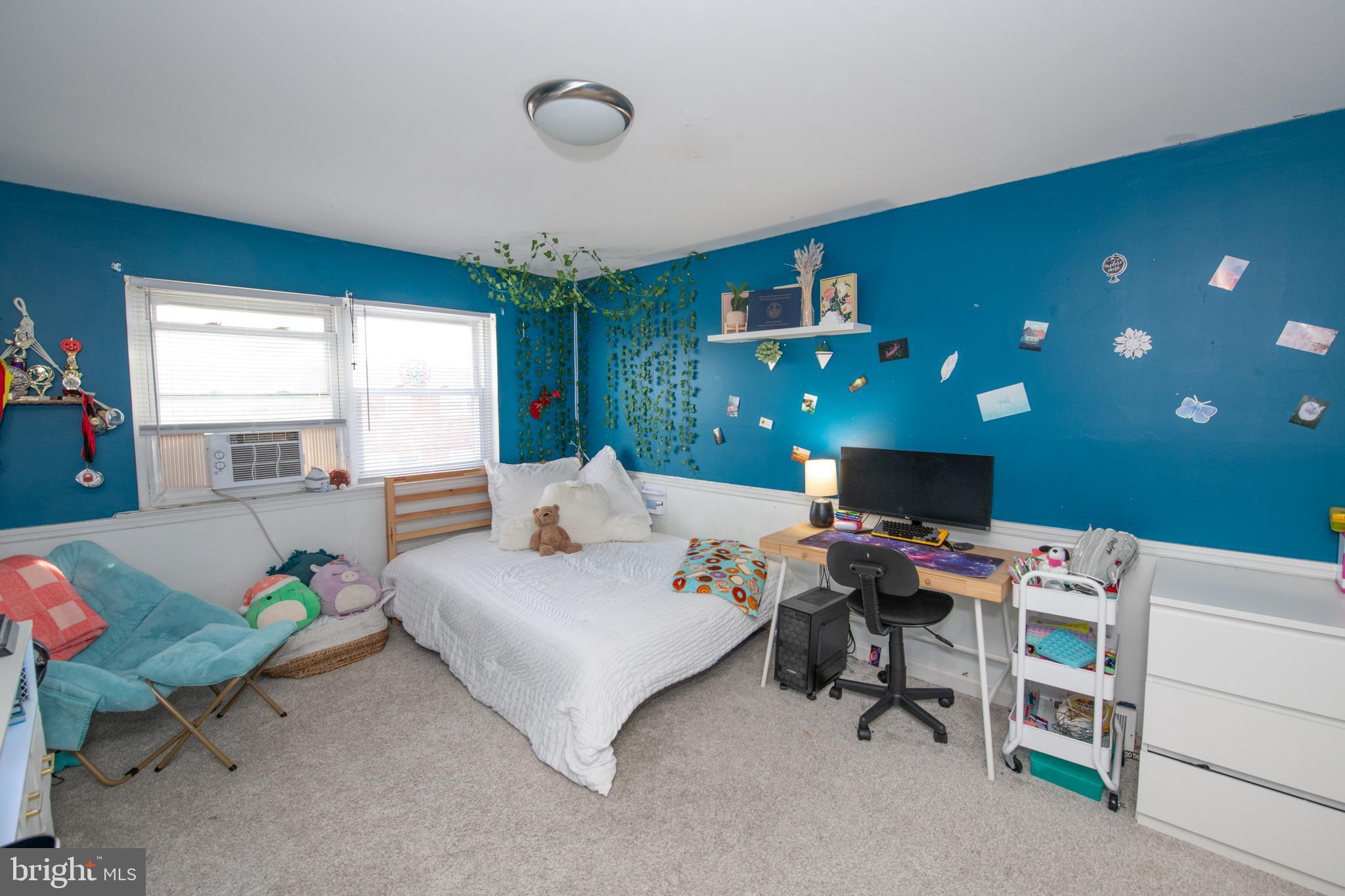 3141 Belgreen Road Philadelphia, PA 19154 - Photo 31 of 51 a bedroom with furniture and a flat screen tv