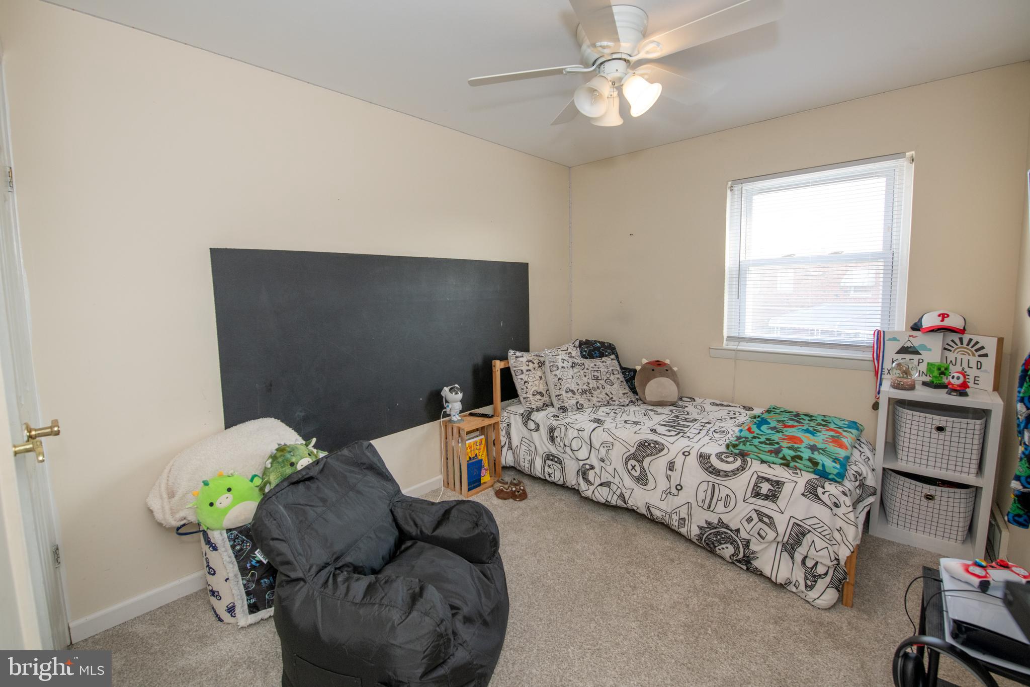 3141 Belgreen Road Philadelphia, PA 19154 - Photo 33 of 51 a bedroom with bed couch and window