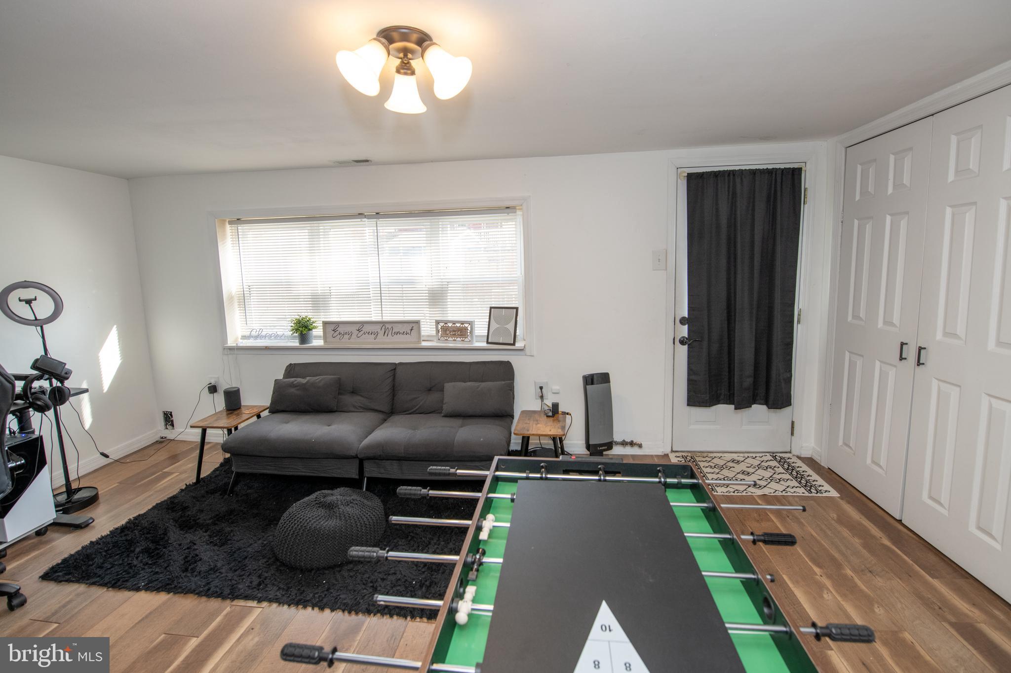3141 Belgreen Road Philadelphia, PA 19154 - Photo 44 of 51 a living room with furniture and a large window