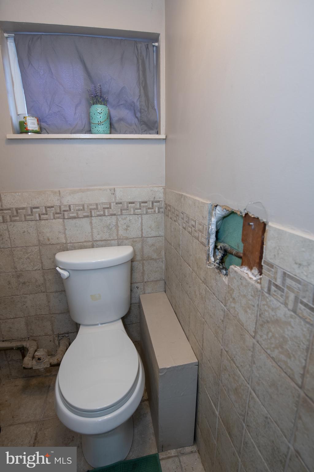 3141 Belgreen Road Philadelphia, PA 19154 - Photo 46 of 51 a bathroom with a toilet and a sink