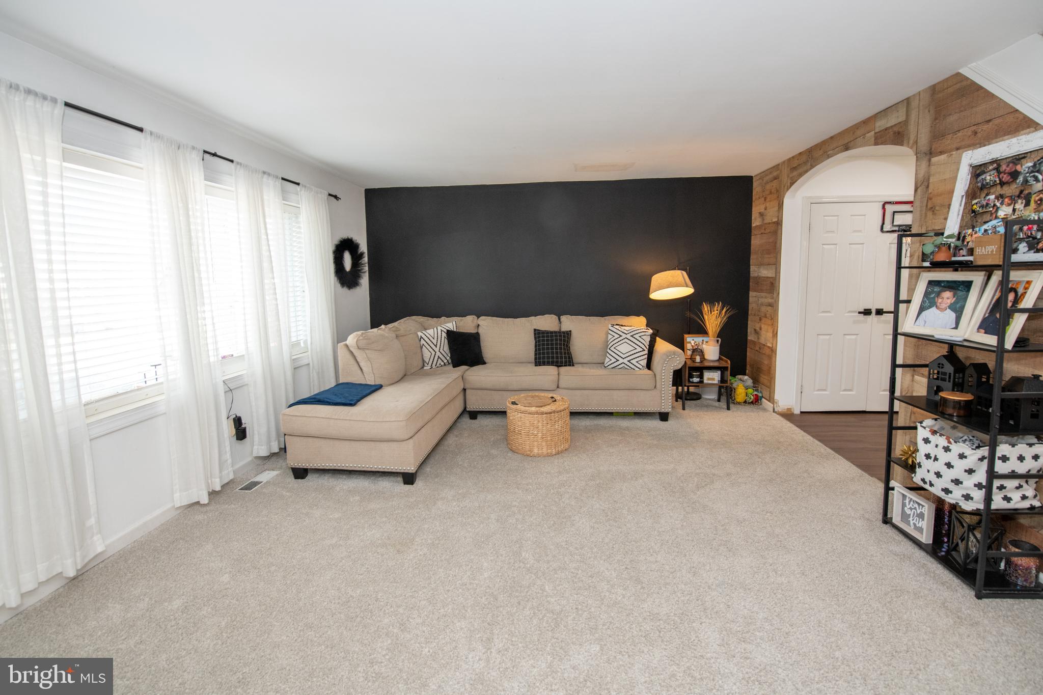 3141 Belgreen Road Philadelphia, PA 19154 - Photo 8 of 51 a living room with furniture and a window