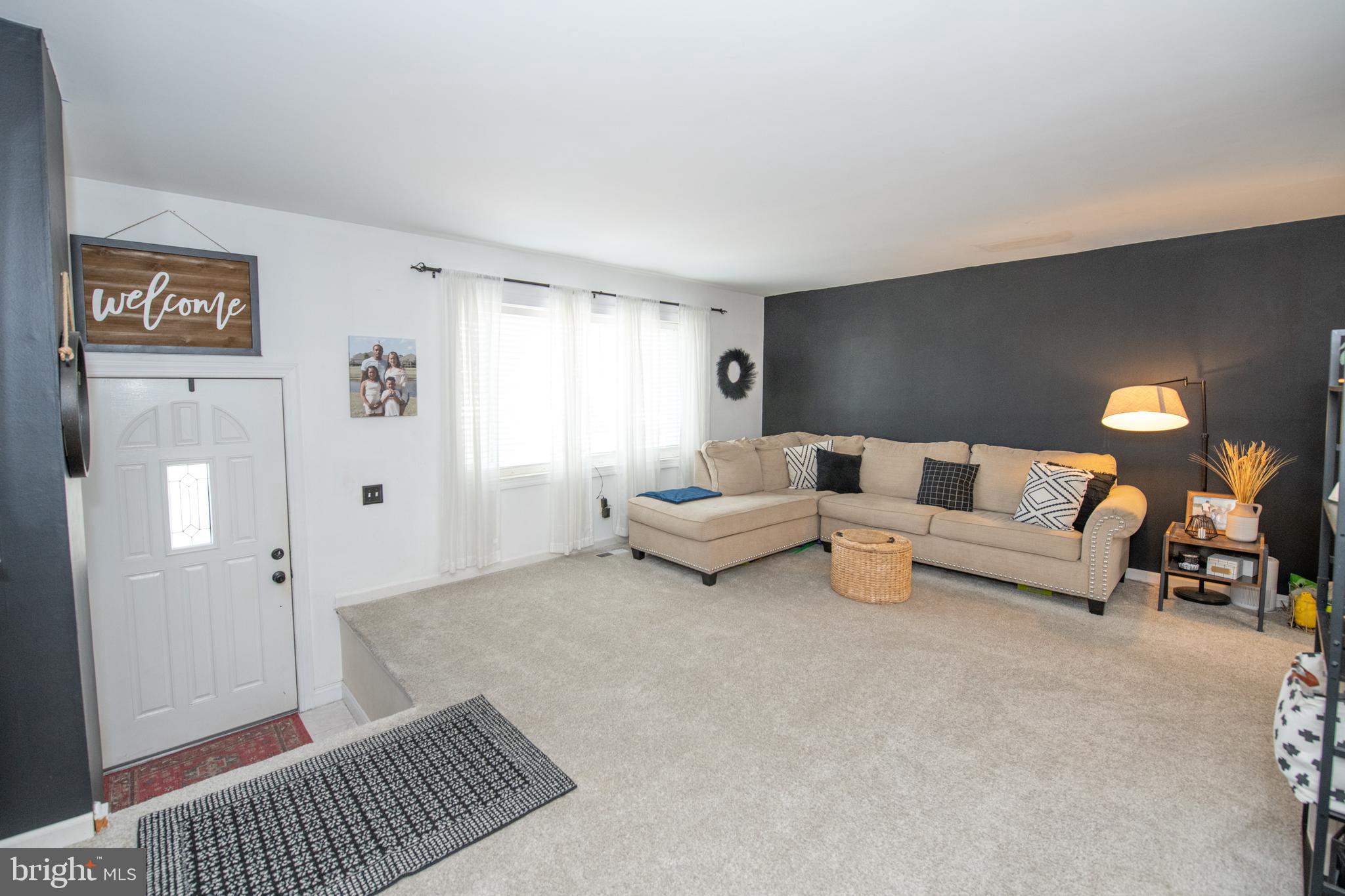 3141 Belgreen Road Philadelphia, PA 19154 - Photo 9 of 51 a living room with furniture and a couch