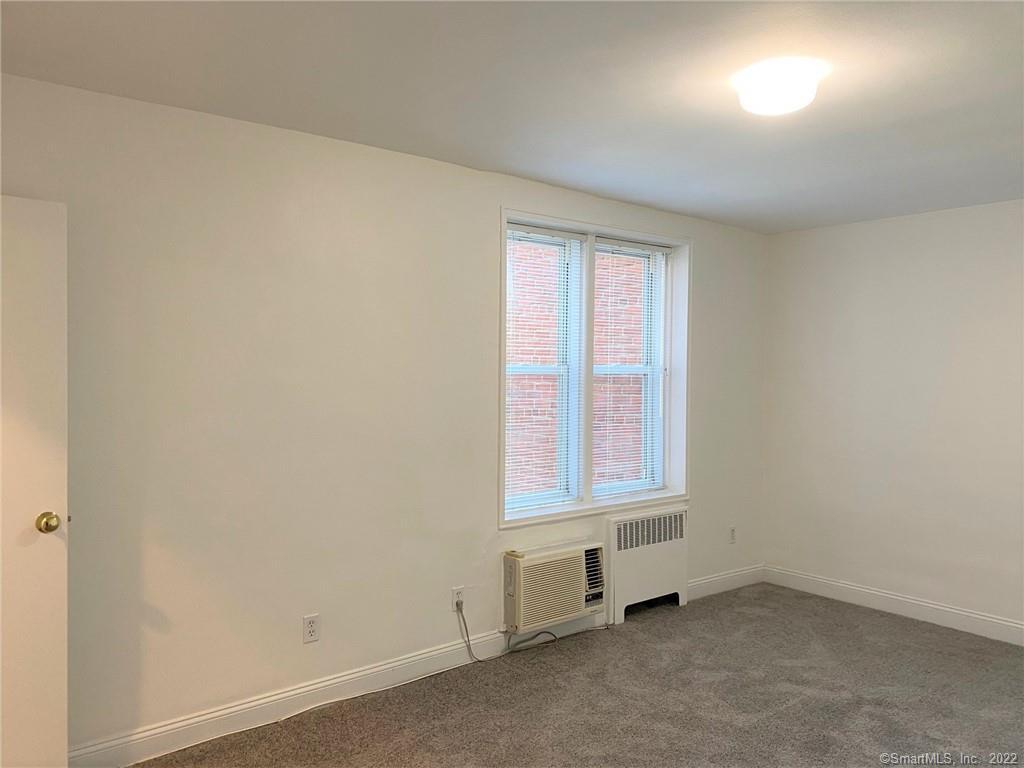 46 Prospect Avenue, Unit 3D Norwalk, CT 06850 - Photo 12 of 20 an empty room with a window
