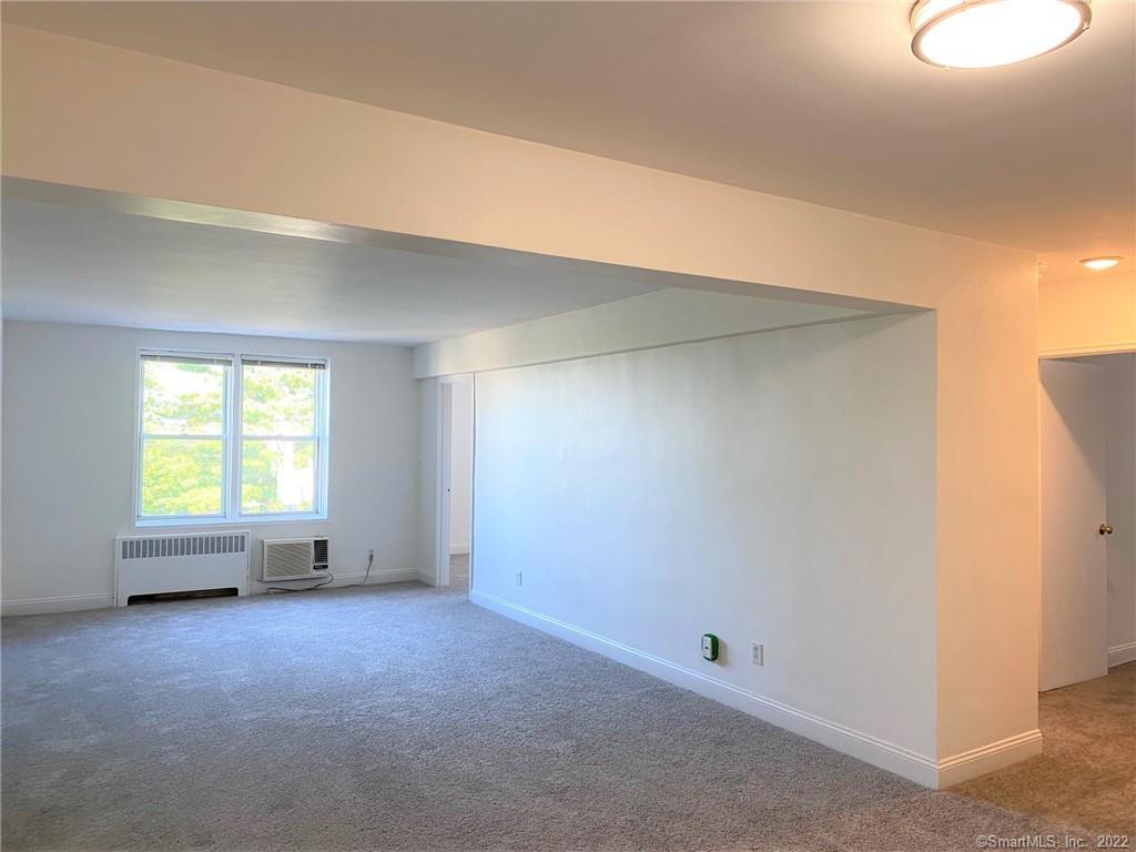 46 Prospect Avenue, Unit 3D Norwalk, CT 06850 - Photo 3 of 20 an empty room with a window