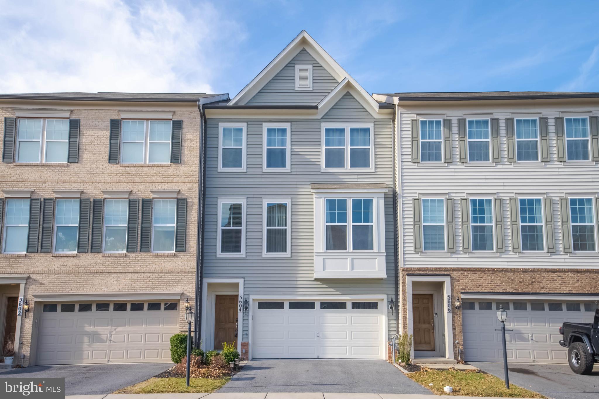 a front view of a building with glass windows