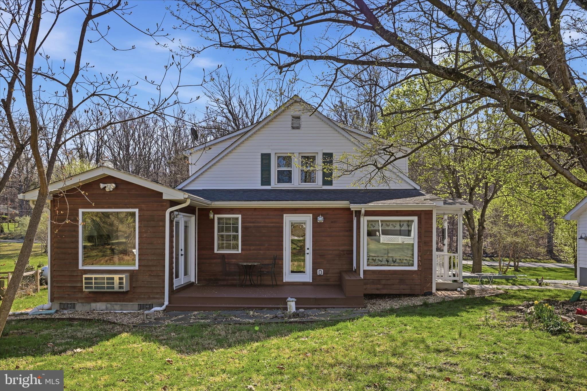 Back Exterior has two exits to yard area
