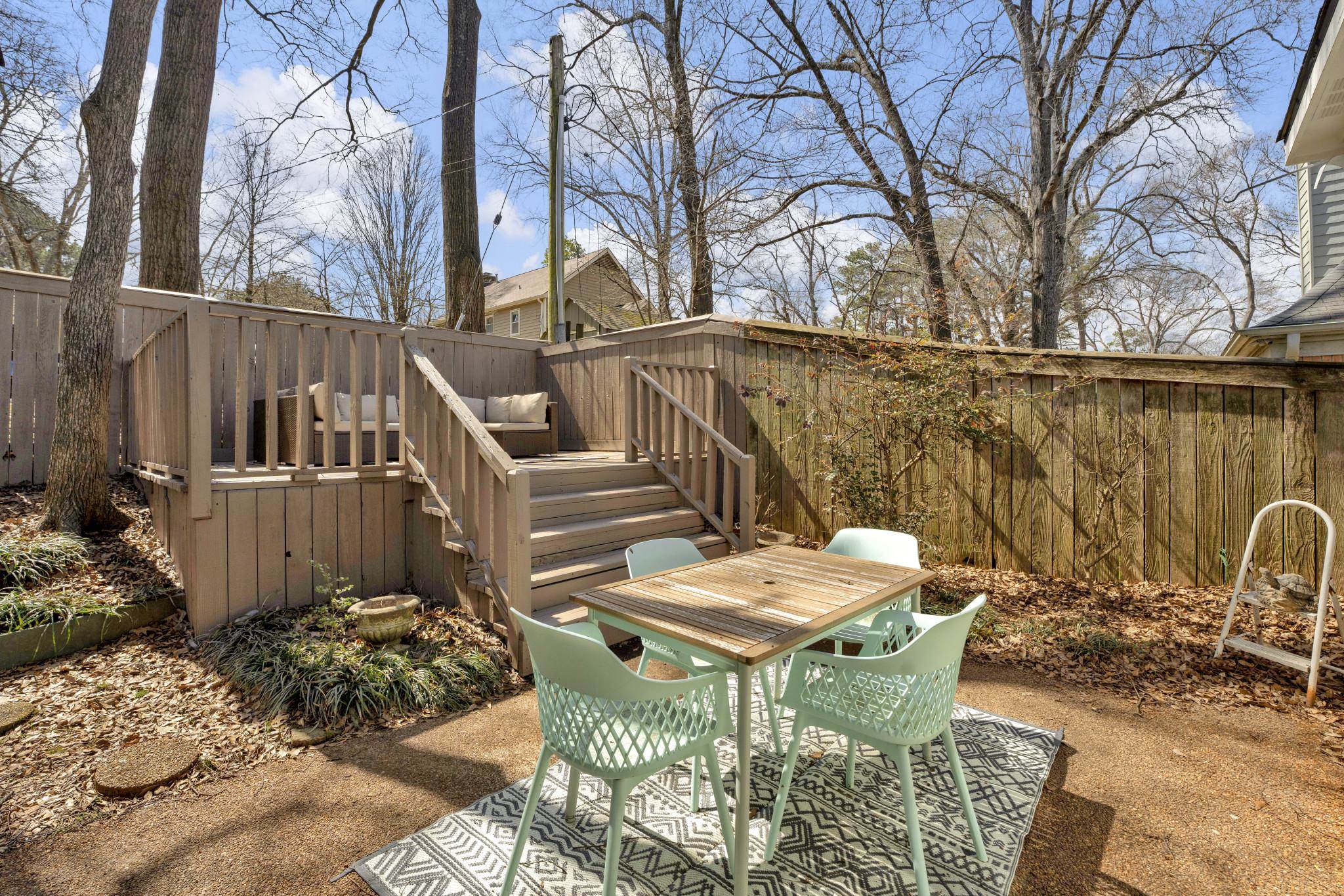 5379 Bentley Place Memphis, TN 38120 - Photo 22 of 25 a view of a chairs and table in backyard