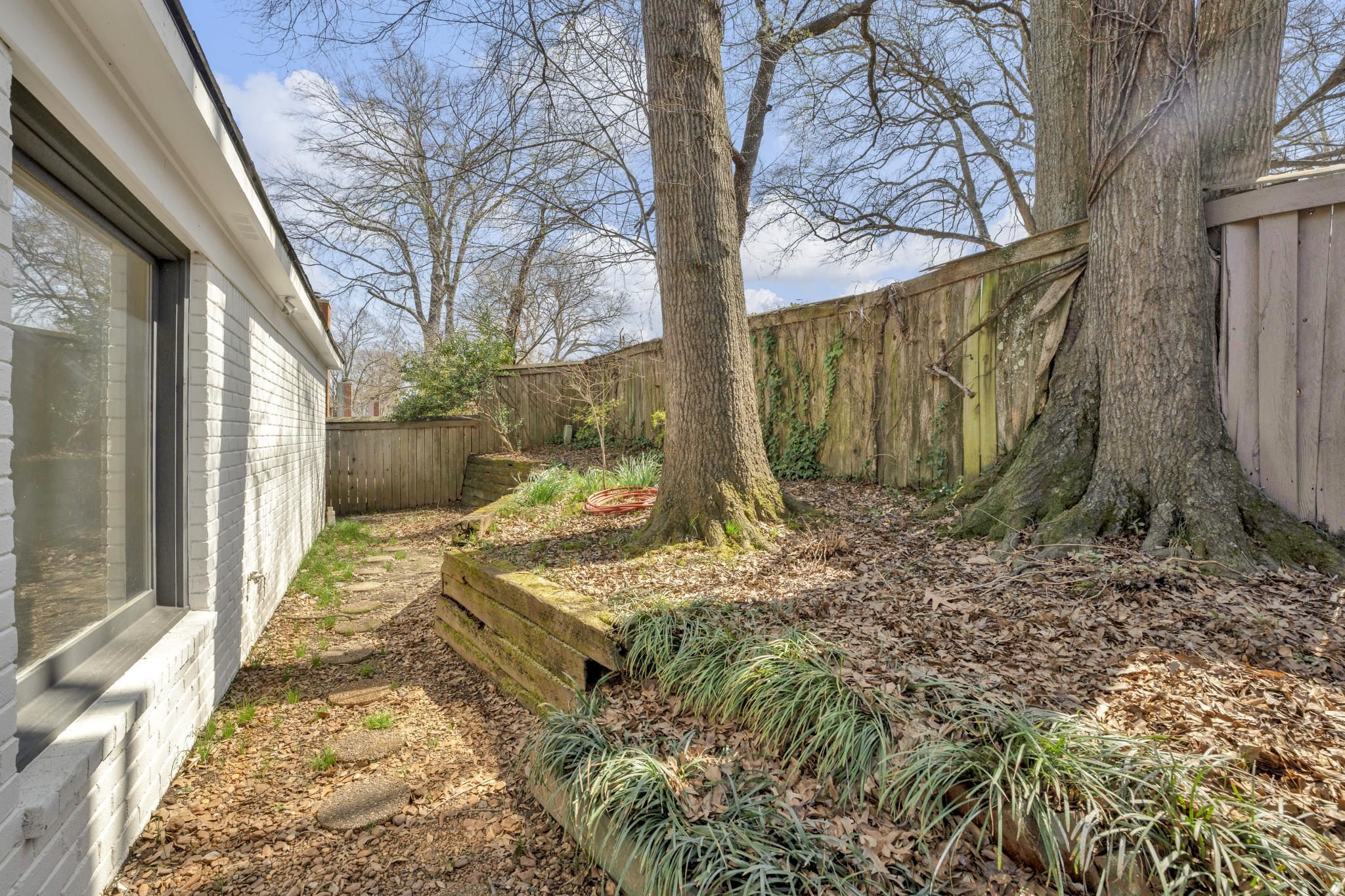 5379 Bentley Place Memphis, TN 38120 - Photo 25 of 25 a view of a backyard of the house