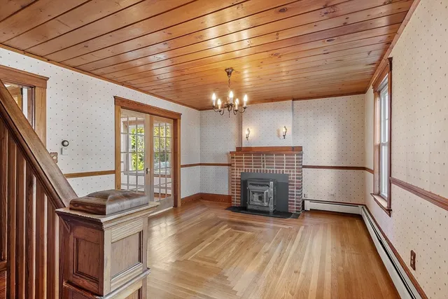 a view of kitchen with furniture and fireplace