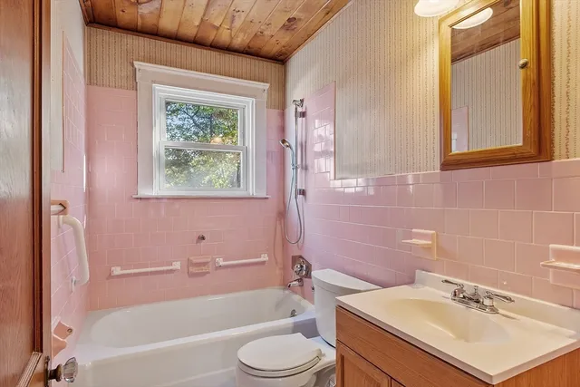 a bathroom with a sink toilet bathtub and shower