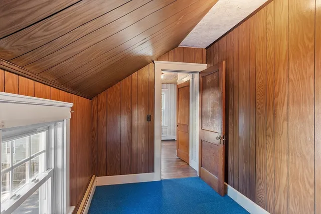 a view of a wooden roof deck