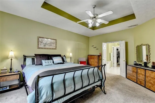 a view of a backyard with lawn chairs and a backyard