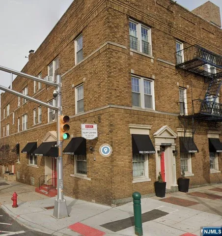 a front view of a building with street