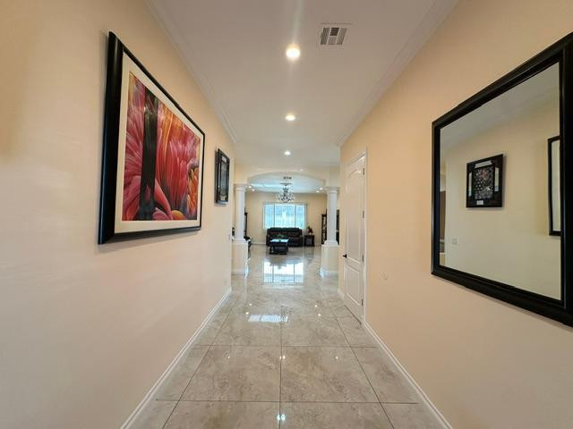 6830 North 14th Street Phoenix, AZ 85014 - Photo 15 of 28 a view of a hallway with a couch