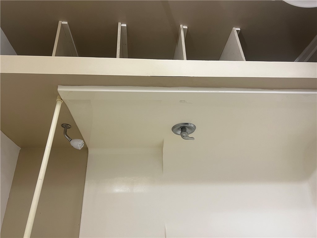 489 Talbert Road McCormick, SC 29835 - Photo 11 of 13 A well-maintained shower area offers practical, refreshing utility.