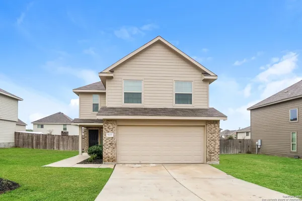 a front view of house with yard