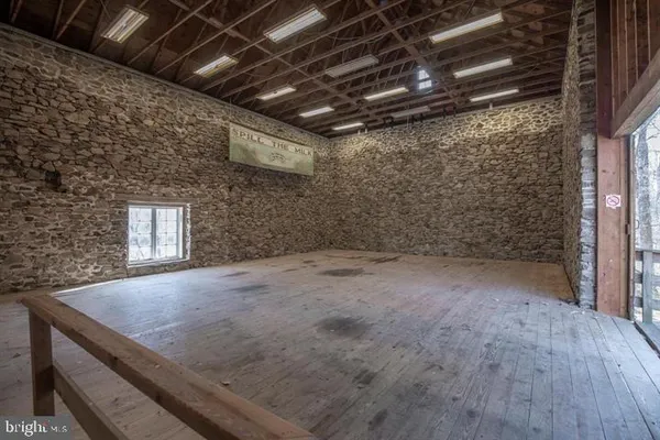 a view of empty room with windows