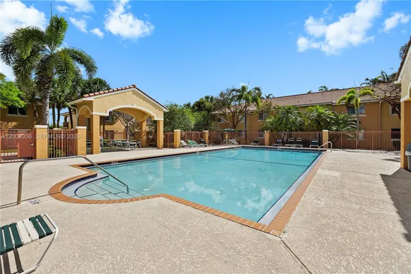 a view of a house with a swimming pool